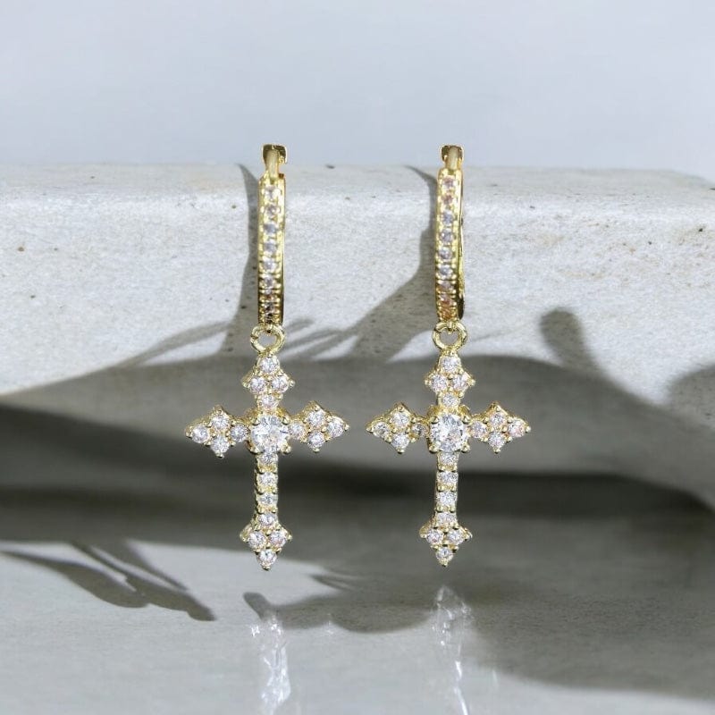 Boucles d’oreilles pour homme en forme de croix dorée avec strass brillants