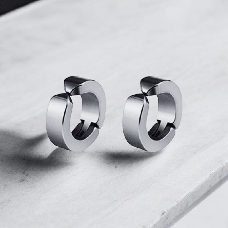 Boucle d'oreille aimant homme en argent