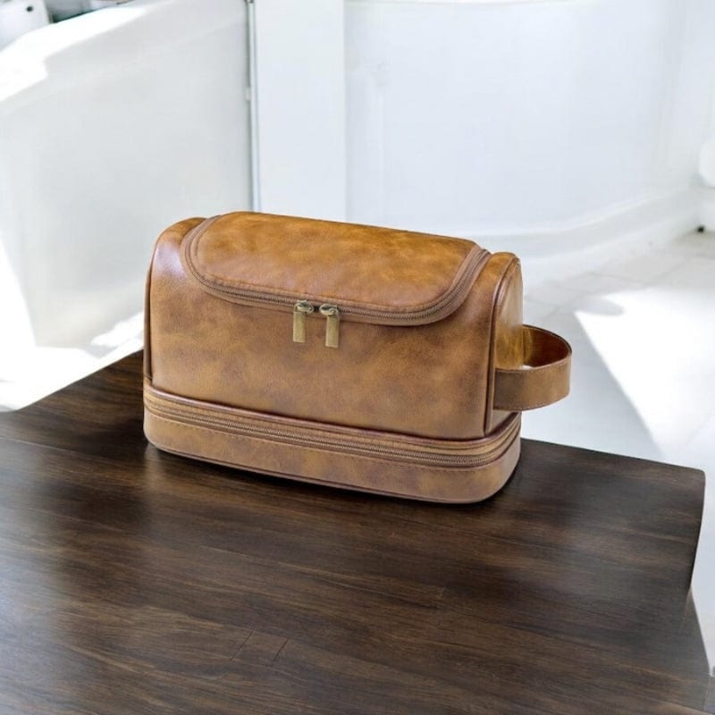 trousse de toilette homme cuir suspendue luxe cognac finitions premium dorées