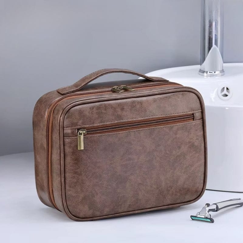 grande trousse de toilette homme marron en cuir avec fermeture éclair