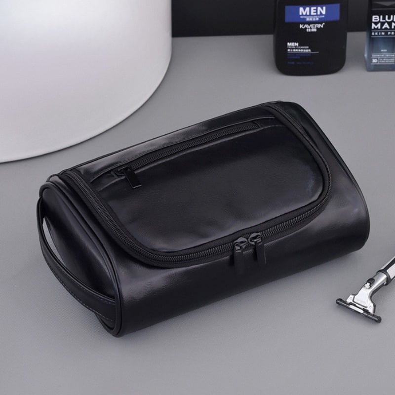 trousse de toilette homme cuir noire compacte avec poignée ergonomique