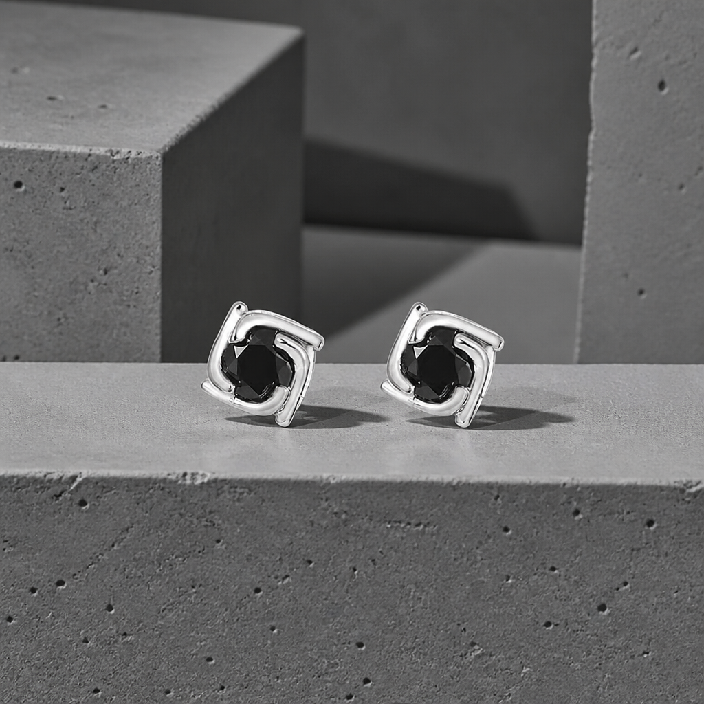 Boucles d'oreilles homme diamant noir en argent 925, la paire sur béton