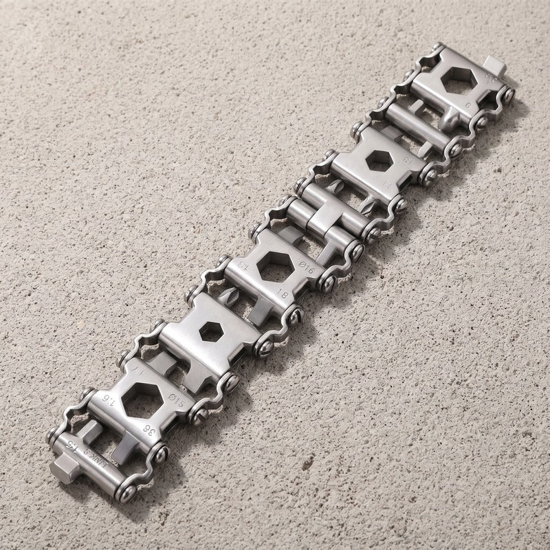 Bracelet homme outil déplié à plat, la bande d'outils sur toute sa longueur