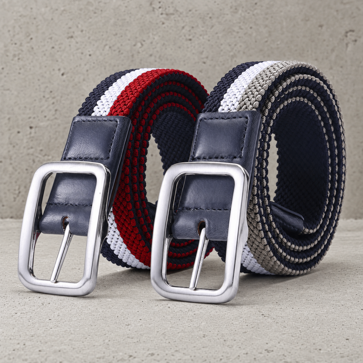 Les deux versions de la ceinture golf homme tressée, bande rouge et bande gris taupe, côte à côte