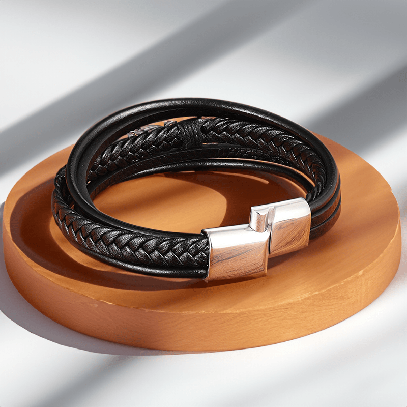 fermoir bracelet cuir et plume en acier argent