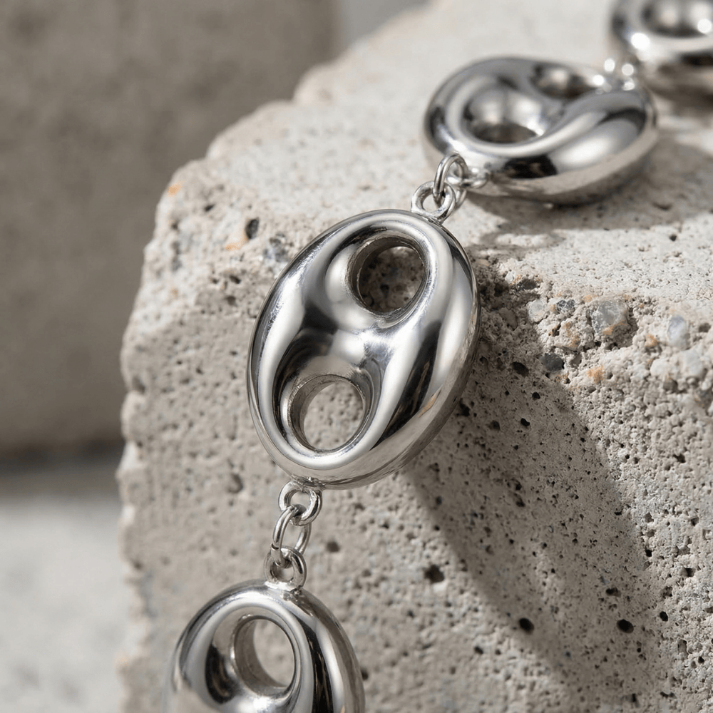 Gourmette homme argent graine de café maillon bombé acier