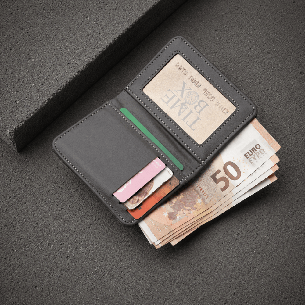 Interieur ouvert du portefeuille compact homme gris en similicuir avec compartiments cartes