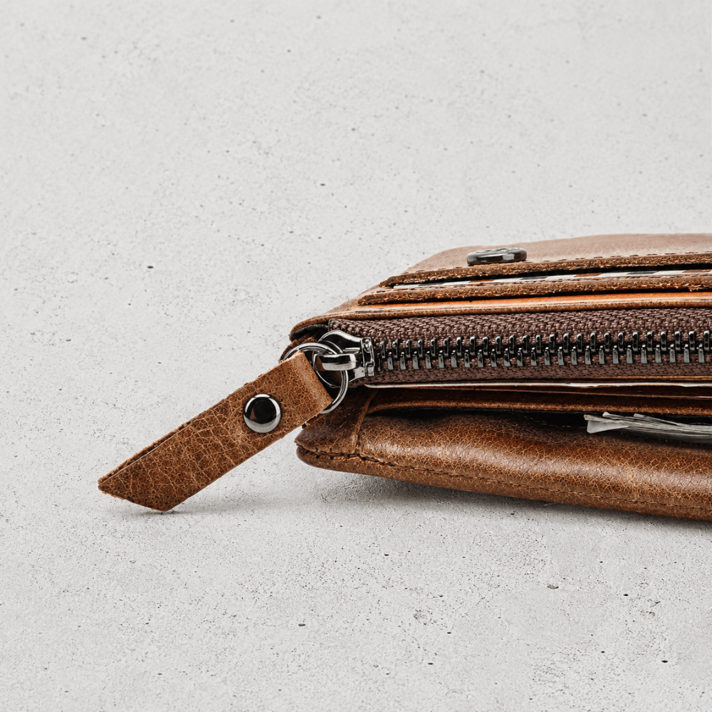 Compartiment à monnaie zippé du portefeuille homme cuir marron