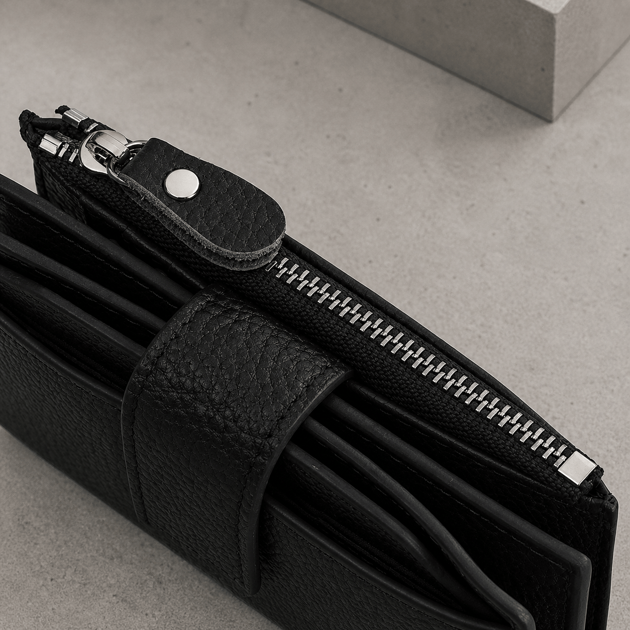 portefeuille homme vachette noir détail zip tirette cuir