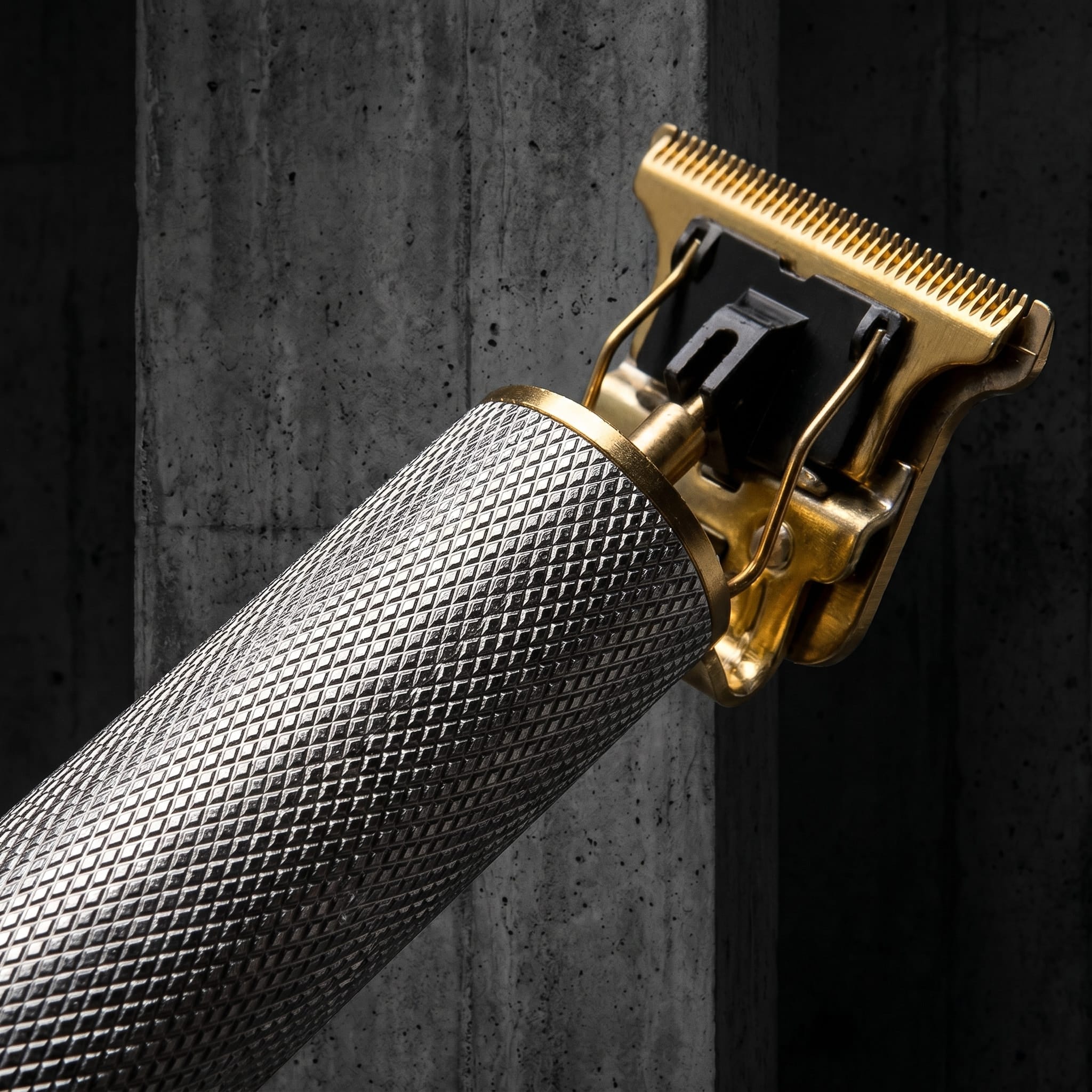 Lames acier inoxydable tondeuse homme argent détail manche texturé