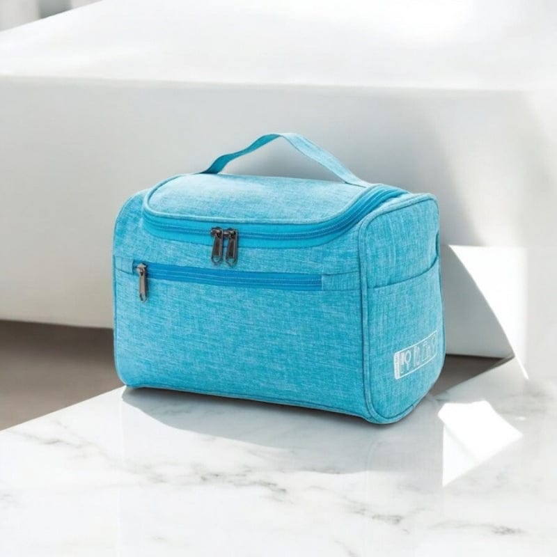 trousse de toilette voyage homme bleu clair compacte avec poignée