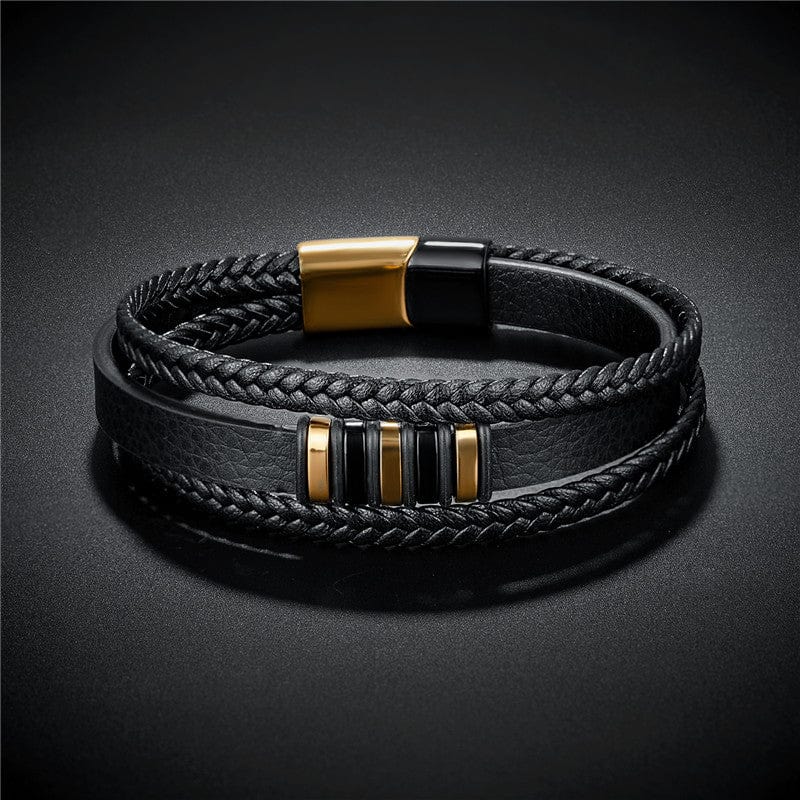 Bracelet en cuir véritable et acier or sur fond noir