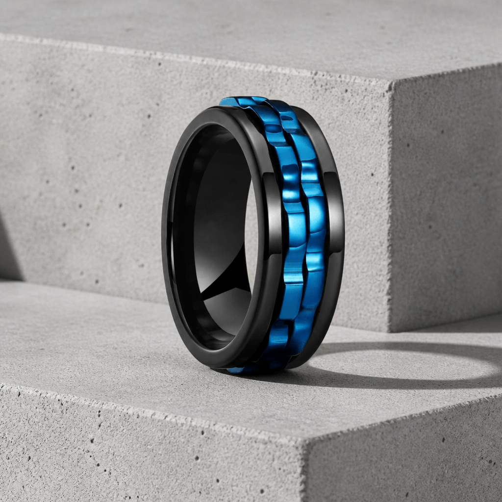 Bague anti-stress homme noire et bleue, maillons tournants bleus sur anneau noir