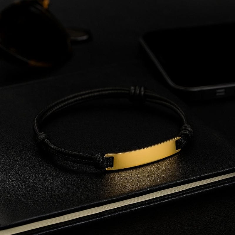Cordon bracelet homme noir avec barrette dorée à graver