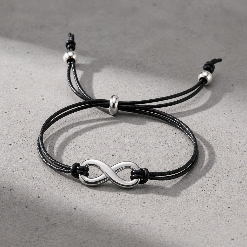 Détail des nœuds coulissants et perles acier du bracelet homme réglable infini