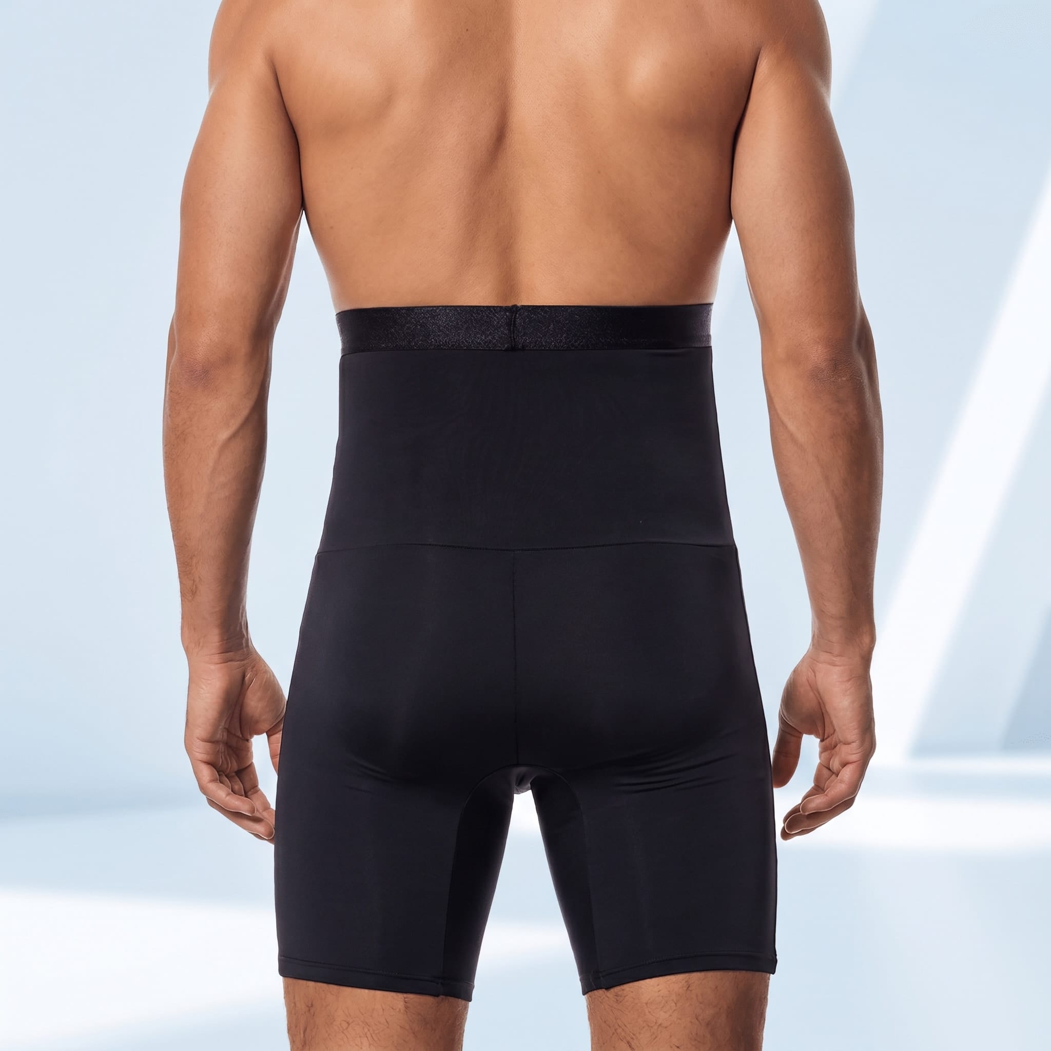 Gaine homme ventre plat noire vue arrière avec soutien lombaire et maintien du dos