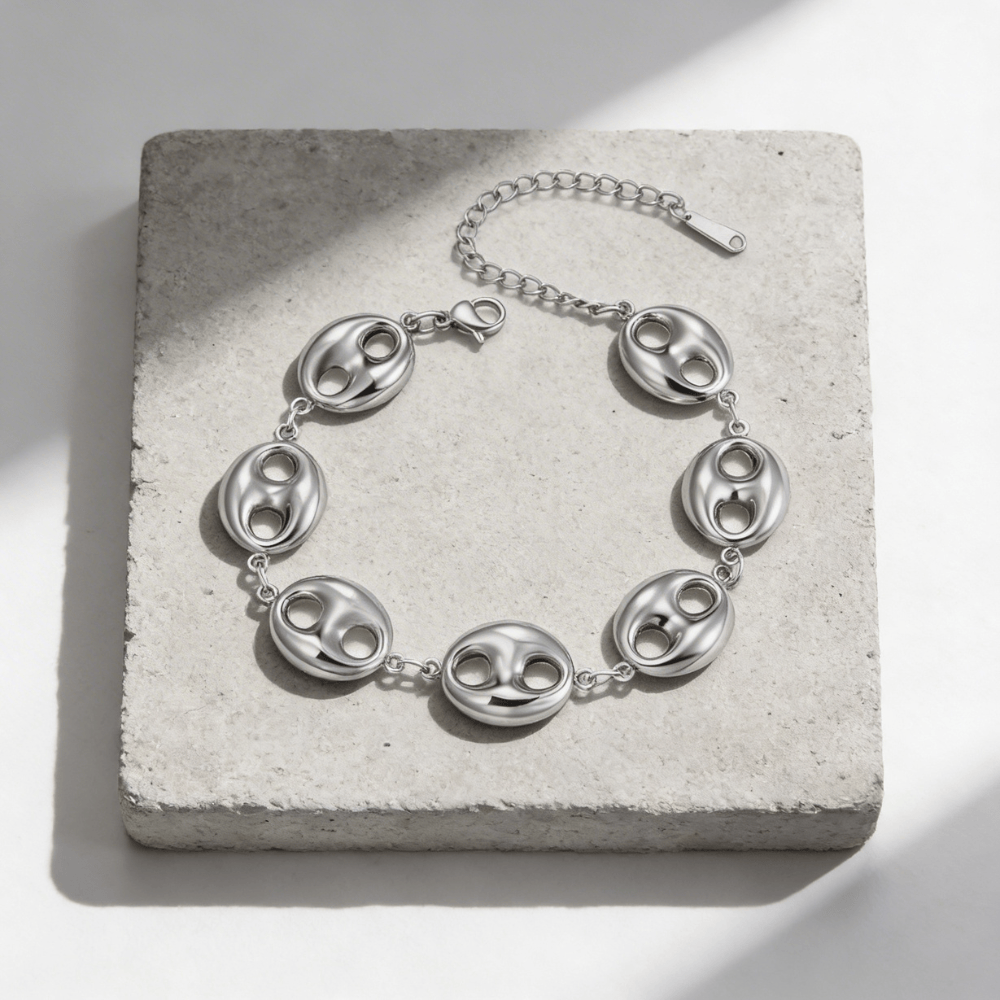 Gourmette graine de café argent homme maillons bombés acier