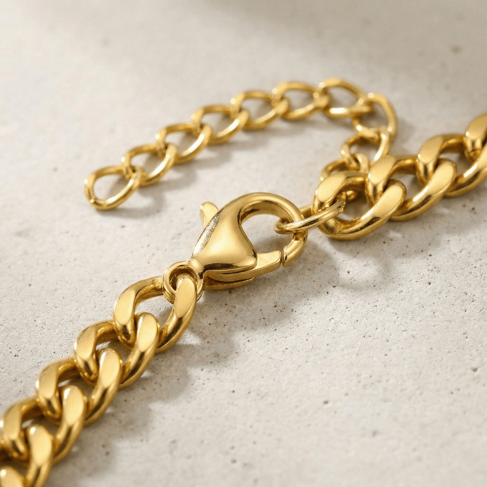 Gourmette or homme maille cubaine fermoir mousqueton acier