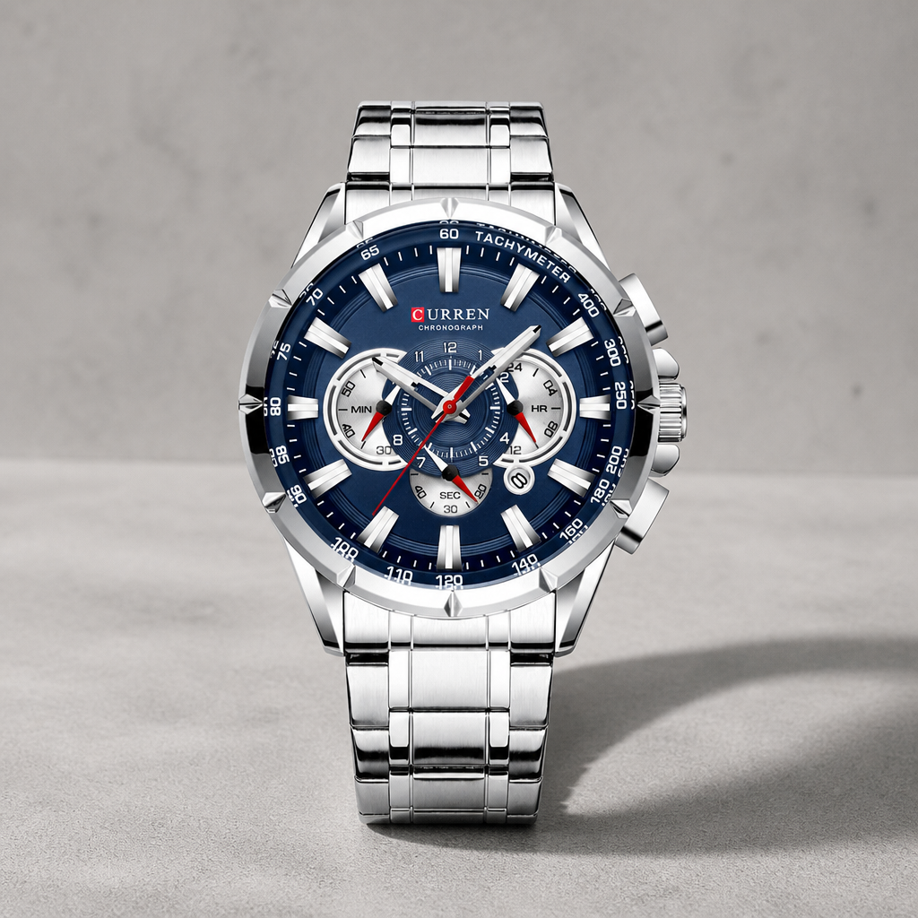 Montre bracelet acier homme chronographe acier et cadran bleu sur dalle de béton