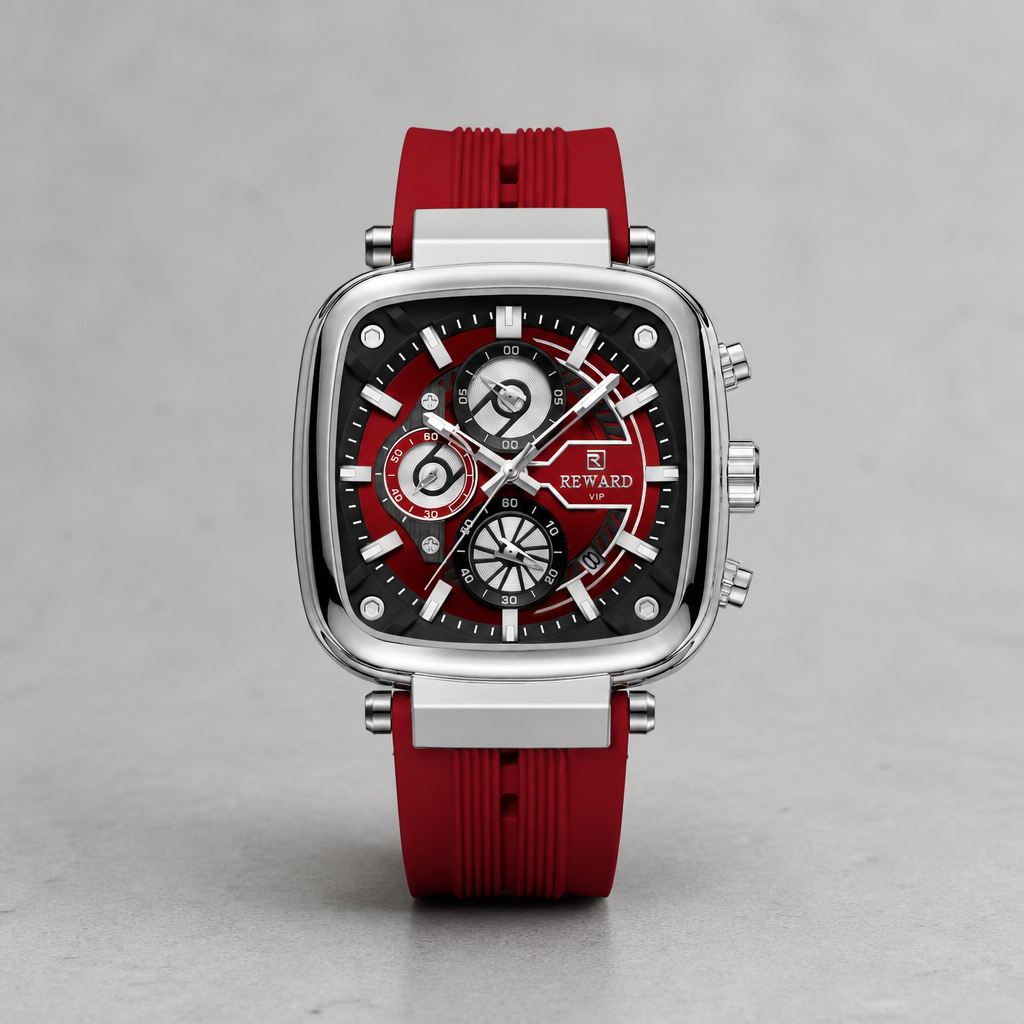 Montre homme cadran rouge et boîtier argent à bracelet silicone rouge sur fond de béton