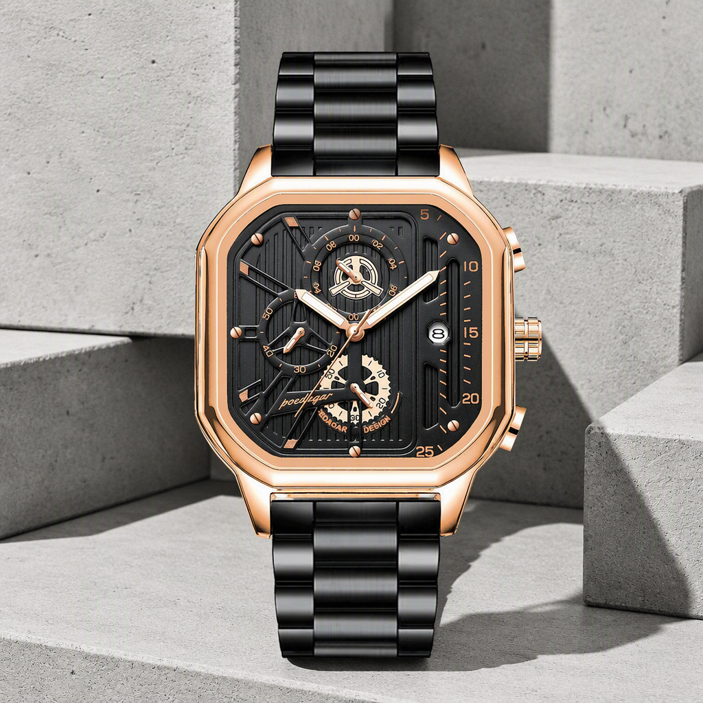 Montre carrée homme au boîtier or rose et bracelet noir posée sur du béton