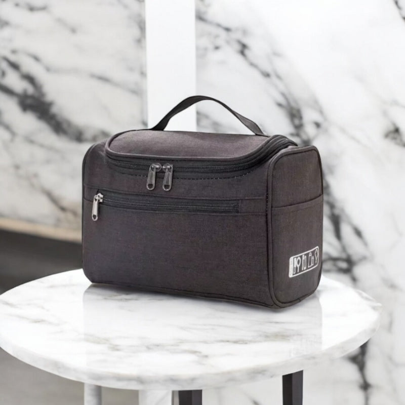 trousse de toilette homme voyage grise en polyester avec fermetures
