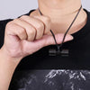 Collier et pendentif haltère noir en acier
